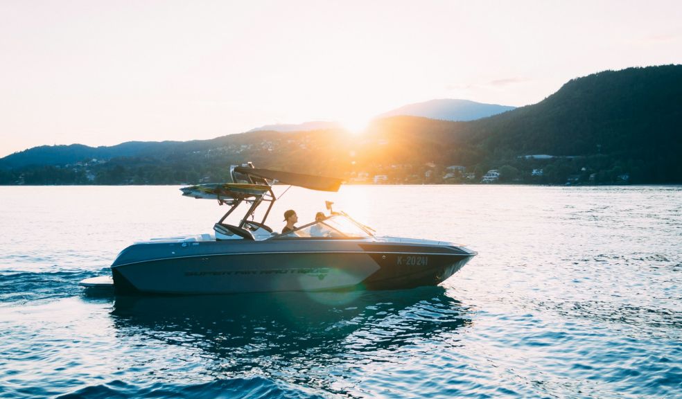 boat on the water at sunset