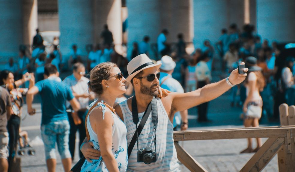 couple taking a selfie on vacation 