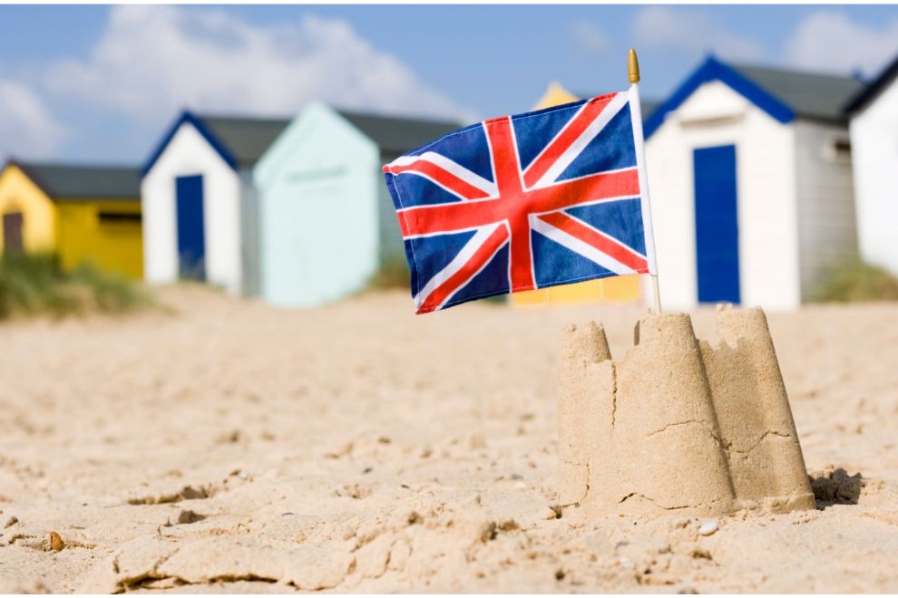 British flag sandcastle beach huts travel