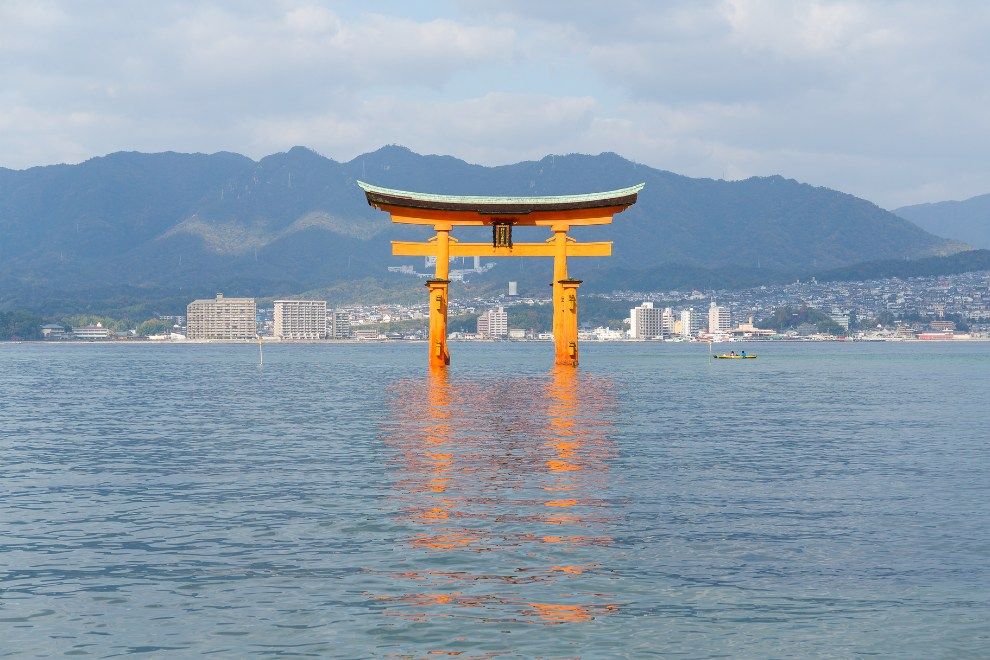 Multi-trip travel trend Experience five different holidays Torii Gate of Miyajima Island Japan