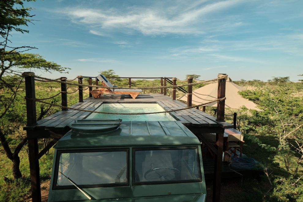 Plunge into Bushs Best Swimming Pools Great Plains Conservation Mara Expedition Camp Kenya travel