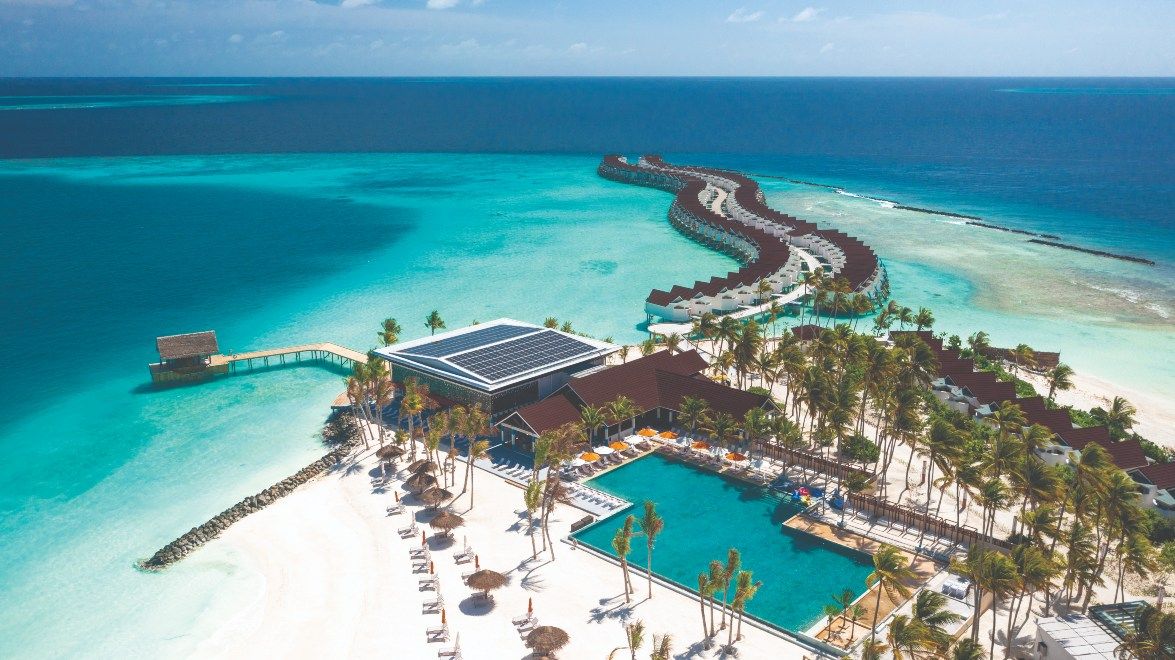 Ten Reasons to Visit OBLU XPERIENCE Ailafushi this Summer Holiday X360 Pool Bar Aerial View travel