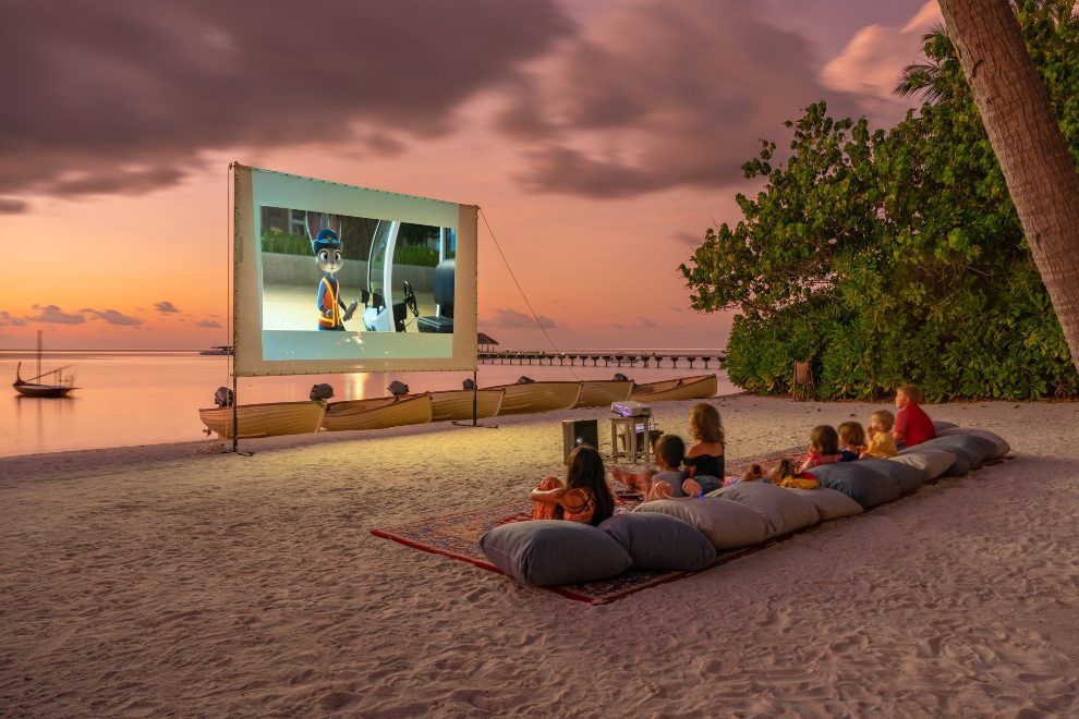 Introducing Bucket-List Family Holidays at Gili Lankanfushi Maldives kids beach cinema
