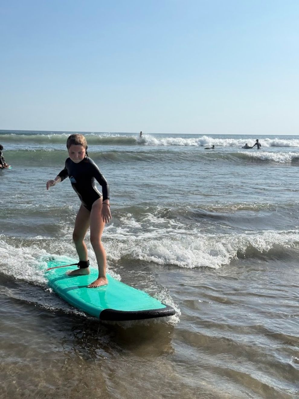 Seminyak Beach Surfing lesson Bali Green Surf School Wanderlearn Worldschooling Family Travel