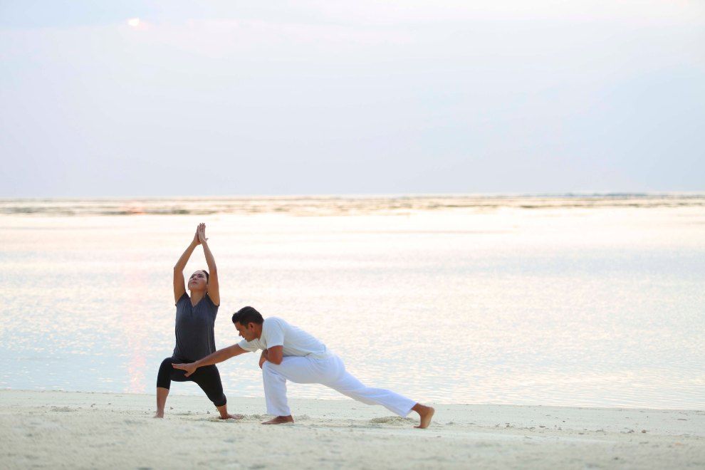 Solo Traveller Packages in The Maldives with Gili Lankanfushi Sunrise yoga