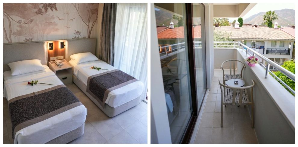 hotel room with 2 beds and balcony