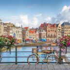 Amsterdam canal flowers bike bridge travel Amsterdam canal flowers bike bridge travel