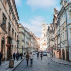 people awlking on a street in Europe in daylight