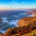 a body of water and cliff