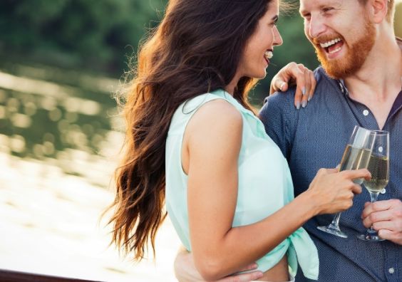 Happy smiling couple in love dancing and flirting outdoor