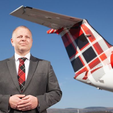 Loganair chief executive Jonathan Hinkles carbon neutral travel