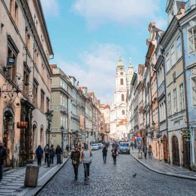 people awlking on a street in Europe in daylight