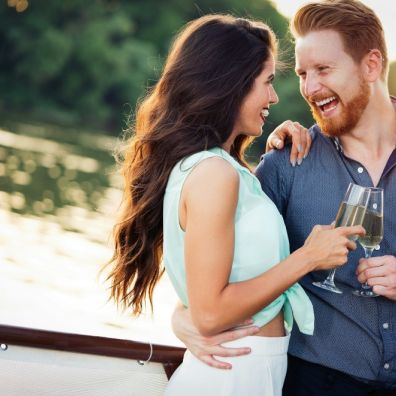 Happy smiling couple in love dancing and flirting outdoor